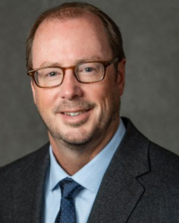Dr. Travis Bracht